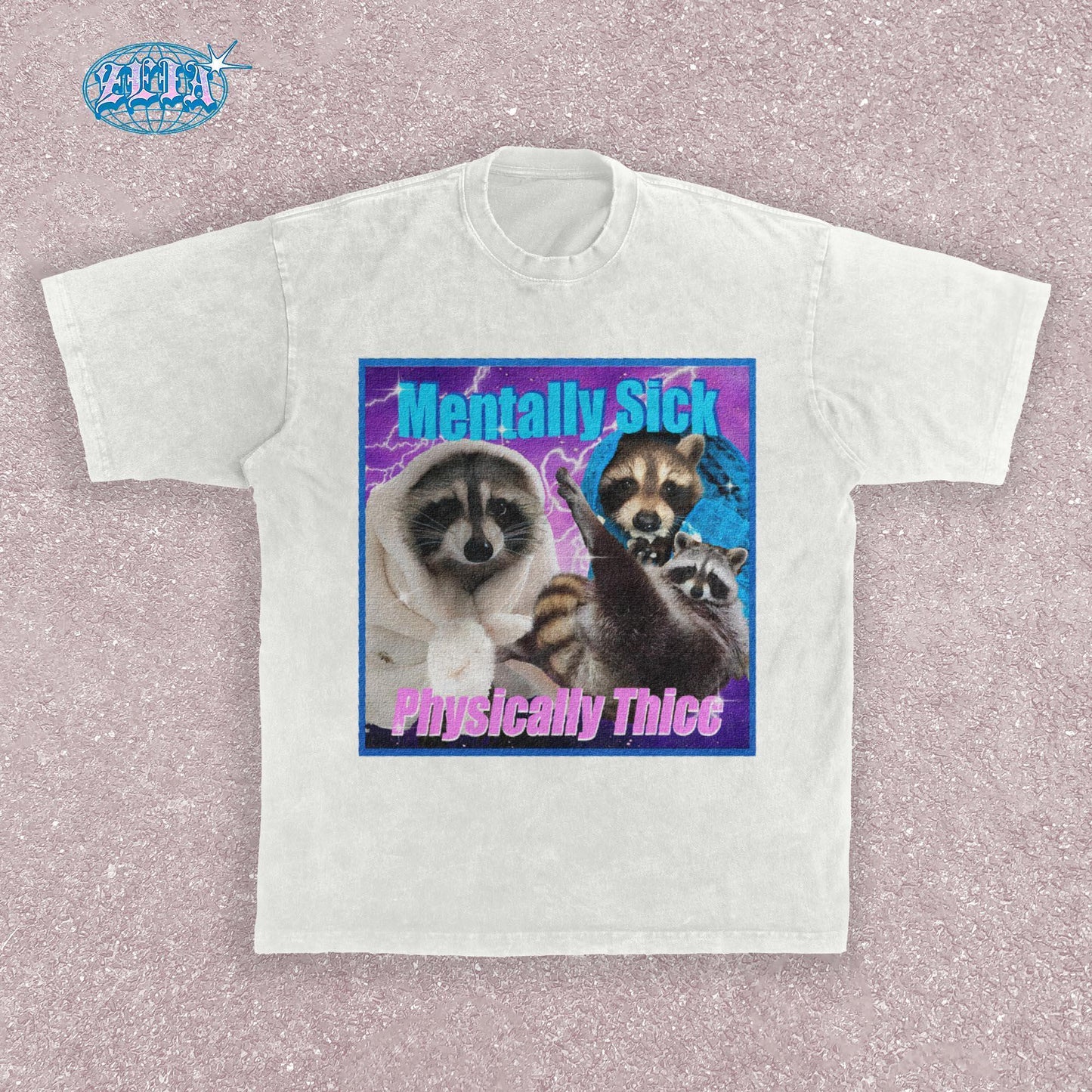 A white t-shirt featuring three raccoons in a y2k aesthetic frame with blue and purple lightning effects, text reads Mentally Sick Physically Thicc in retro style typography