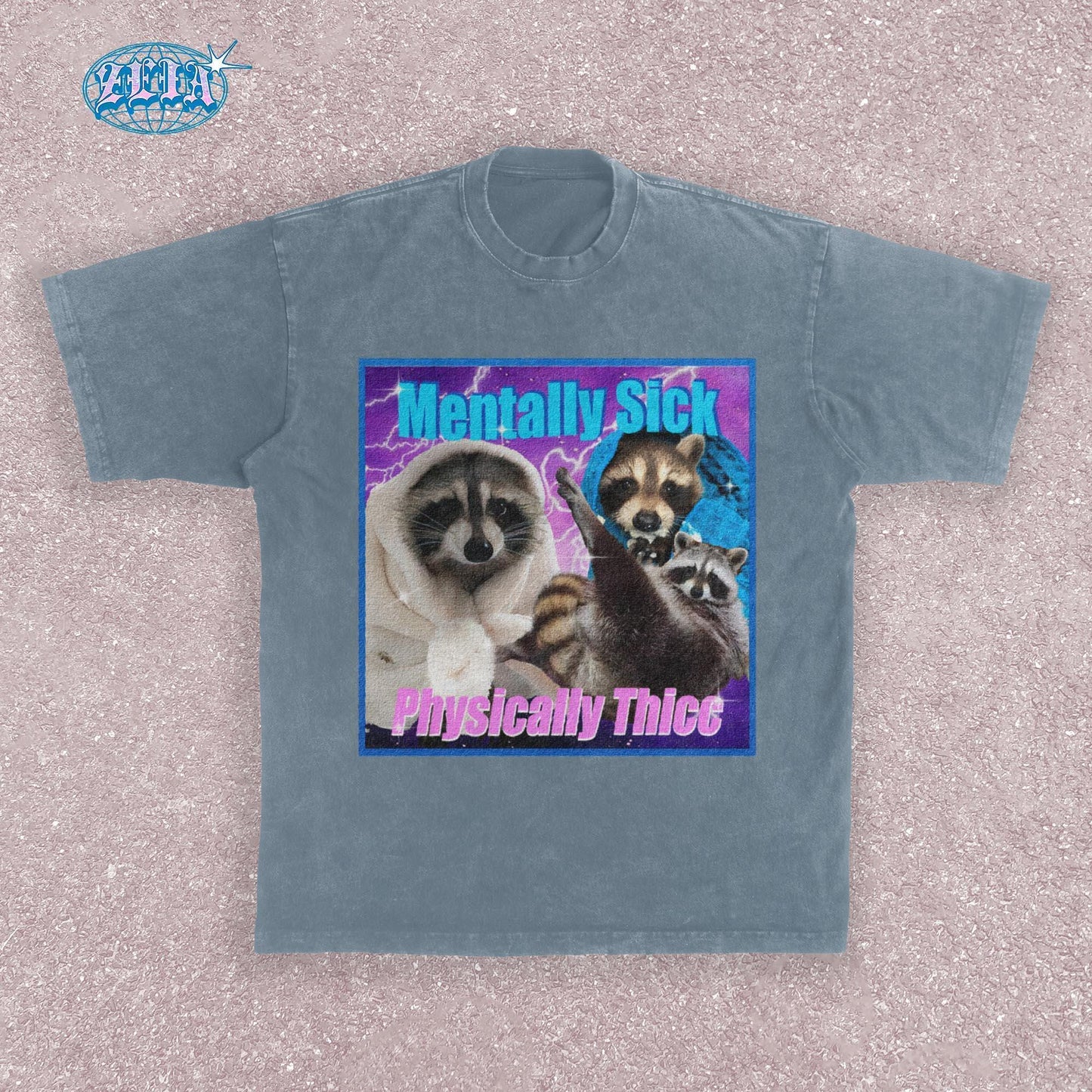 A bue jean t-shirt featuring three raccoons in a y2k aesthetic frame with blue and purple lightning effects, text reads Mentally Sick Physically Thicc in retro style typography