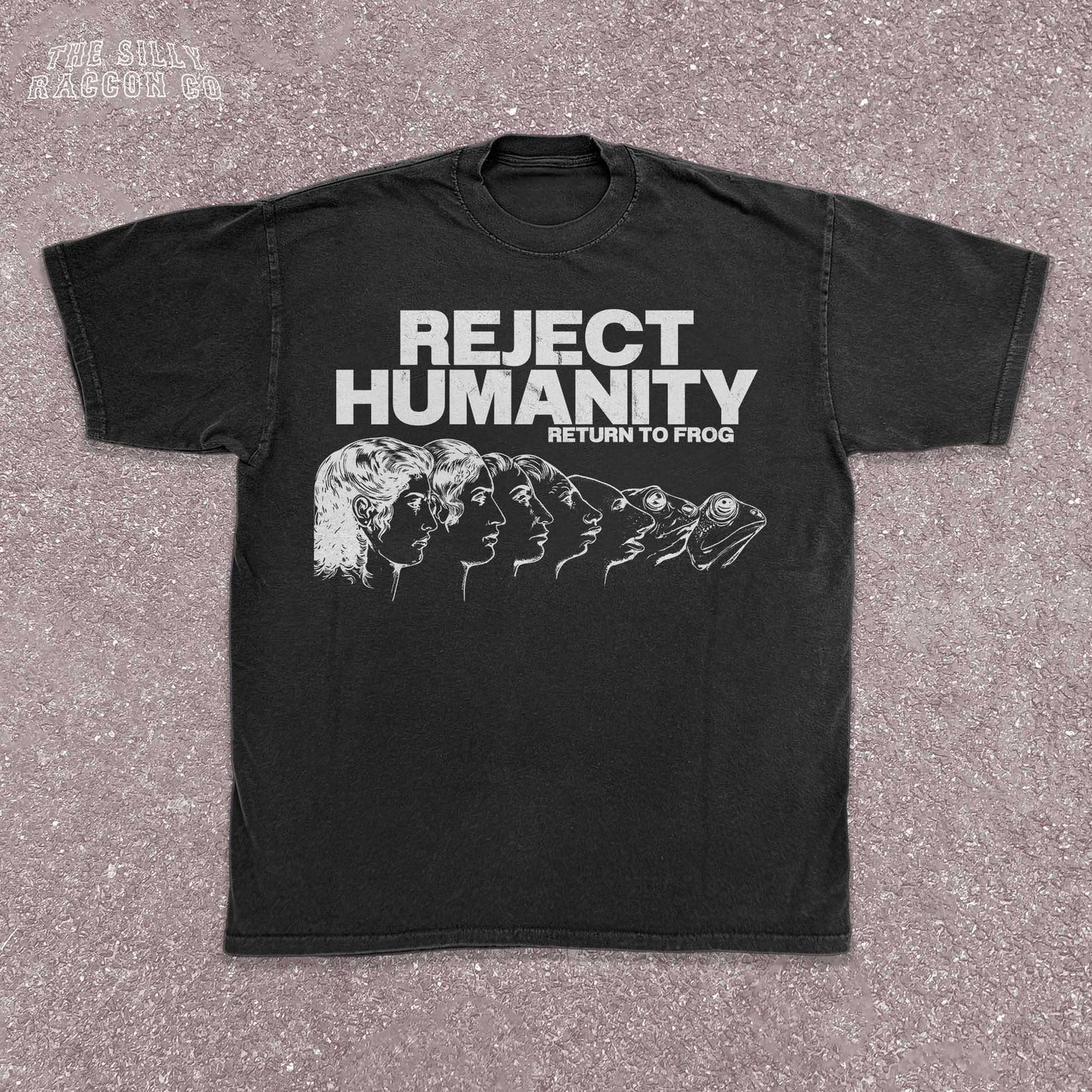 Unisex t-shirt for Gen Z featuring the text "Reject Humanity Return to Frog" in green with an illustrated human-to-frog evolution graphic. Perfect for fans of meme humor, absurdist internet culture, and ironic fashion. Retro Y2K style with soft fabric feel. Great gift idea for frog lovers, internet meme fans, or anyone into weird aesthetics and frogcore vibes.