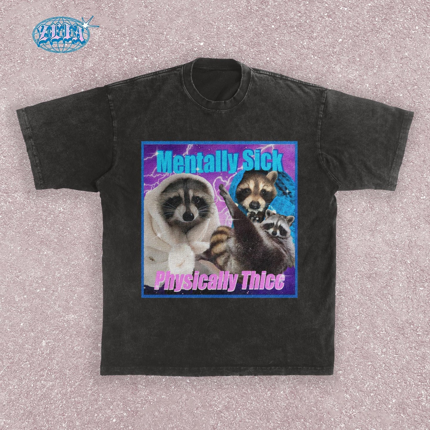 A black t-shirt featuring three raccoons in a y2k aesthetic frame with blue and purple lightning effects, text reads Mentally Sick Physically Thicc in retro style typography