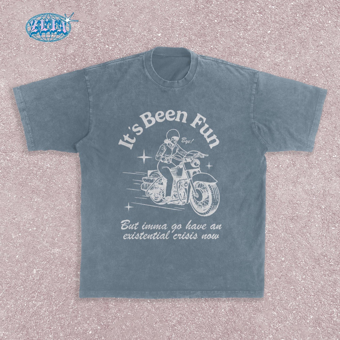 Retro style motorcycle blue jean t-shirt featuring vintage White illustration of classic motorcycle with rider, stars and speed lines, combined with ironic existential crisis text in curved lettering, perfect for bikers.