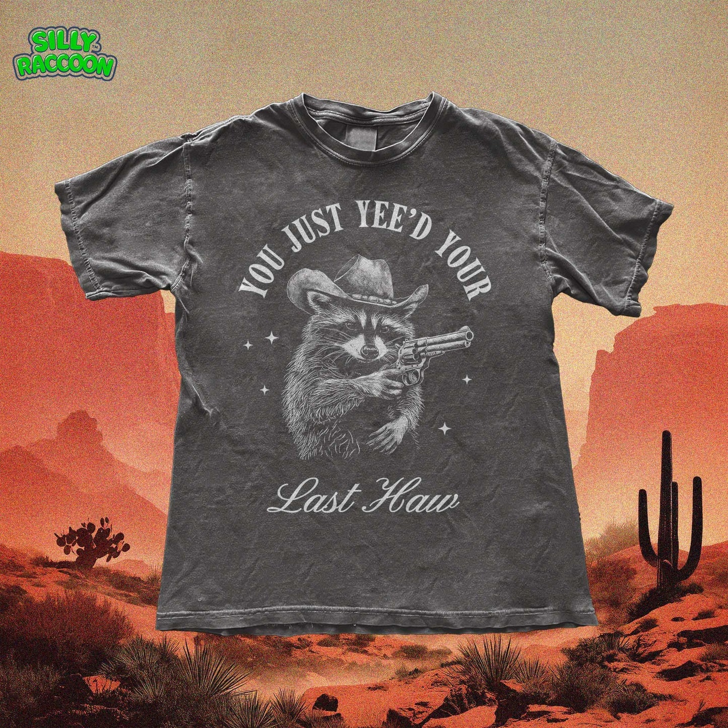 Funny cowboy raccoon t-shirt featuring a vintage-style hand-drawn raccoon in a cowboy hat holding a revolver. This Western humor graphic tee is perfect for country lovers, rodeo fans, and meme enthusiasts. Designed for men and women who love Southern slang, Wild West culture, and outlaw aesthetics. Great for casual wear, cowboy-themed parties, or as a hilarious gift for raccoon lovers and Western humor fans.