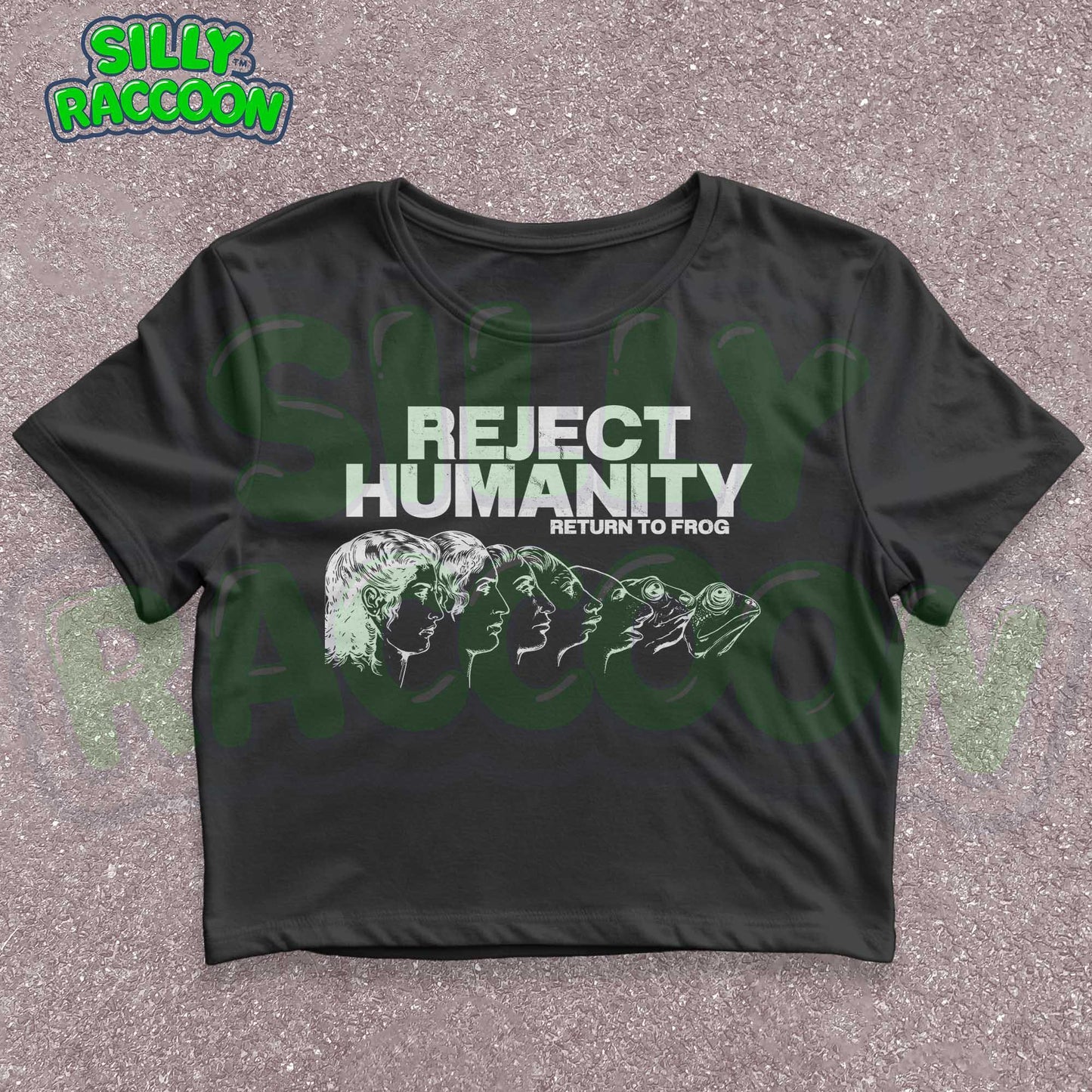 Young woman wearing a white Y2K baby tee, perfect for Gen Z fashion lovers and teens into alt clothing. The shirt features a green graphic print with the text "REJECT HUMANITY RETURN TO FROG" and an illustration showing human faces morphing into frogs. This funny meme shirt taps into internet culture and weirdcore aesthetic. It's a great sarcastic gift for anti-social friends or any frog lover. Ideal casual wear top, this graphic tee suits everyday outfits or alternative style look