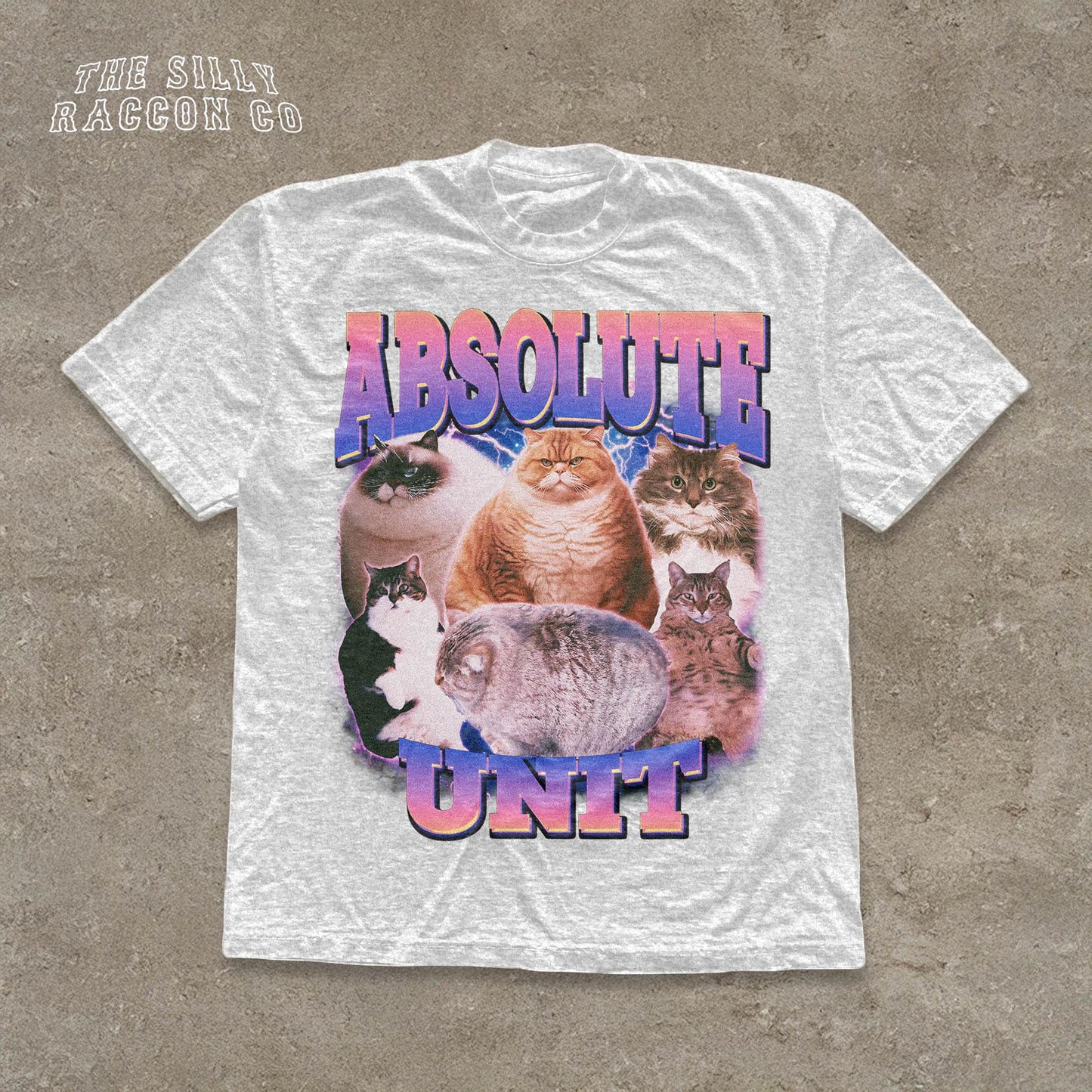 A white t-shirt with a graphic design featuring a group of cats, including a large cat in the center surrounded by smaller cats.