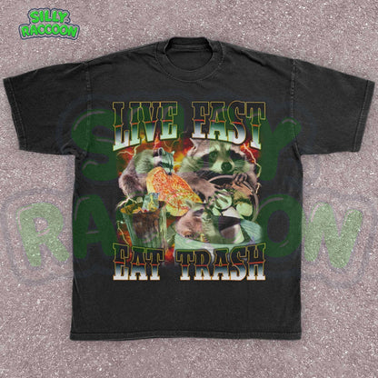 Funny raccoon graphic shirt for men and women featuring chaotic dumpster raccoons in a vintage meme collage style. Bold distressed text reads &quot;Live Fast Eat Trash&quot; over retro raccoons eating pizza and digging in garbage. Designed for meme lovers, unhinged humor fans, and raccoon-core enthusiasts. Perfect for birthdays, Gen Z humor gifts, or streetwear animal aesthetics. Makes a hilarious gift for trash panda lovers or quirky friends.