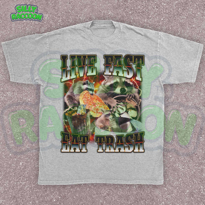 Funny raccoon graphic shirt for men and women featuring chaotic dumpster raccoons in a vintage meme collage style. Bold distressed text reads &quot;Live Fast Eat Trash&quot; over retro raccoons eating pizza and digging in garbage. Designed for meme lovers, unhinged humor fans, and raccoon-core enthusiasts. Perfect for birthdays, Gen Z humor gifts, or streetwear animal aesthetics. Makes a hilarious gift for trash panda lovers or quirky friends.