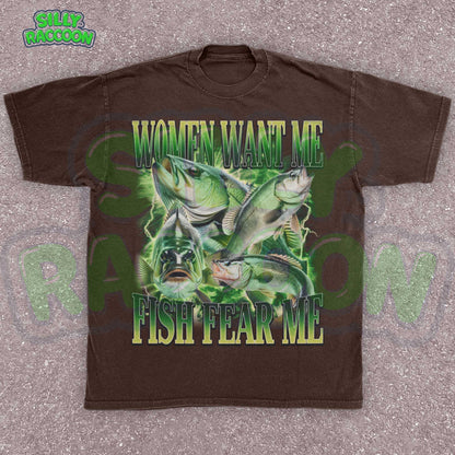 Funny fishing shirt for men featuring the phrase “Women Want Me Fish Fear Me” with bold green bass fish graphics in a retro 90s style. Perfect ironic meme tee for boyfriend, dad, or outdoorsy guy with a sense of humor. Ideal gift for Father&#39;s Day, birthdays, or cringe-loving meme fans. Eye-catching vintage-style design with outdoor aesthetic and masculine humor appeal.