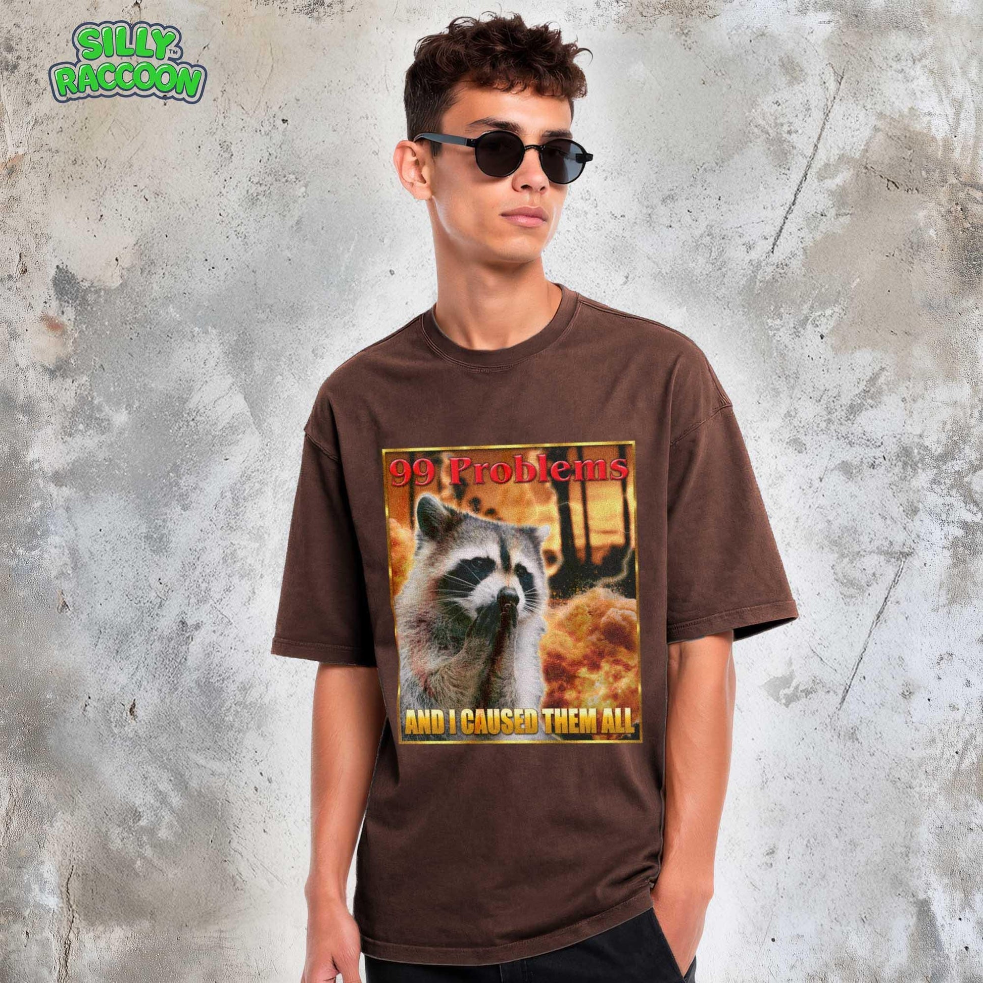 This Comfort Colors t-shirt features a funny raccoon meme design perfect for women and men who love weird, sarcastic humor. The retro-style graphic on this unisex tee shows a raccoon looking guilty with the text &quot;99 Problems AND I CAUSED THEM ALL,&quot; ideal for casual wear or as a gag gift for a friend who appreciates ironic, unhinged shirts and possum-themed humor.