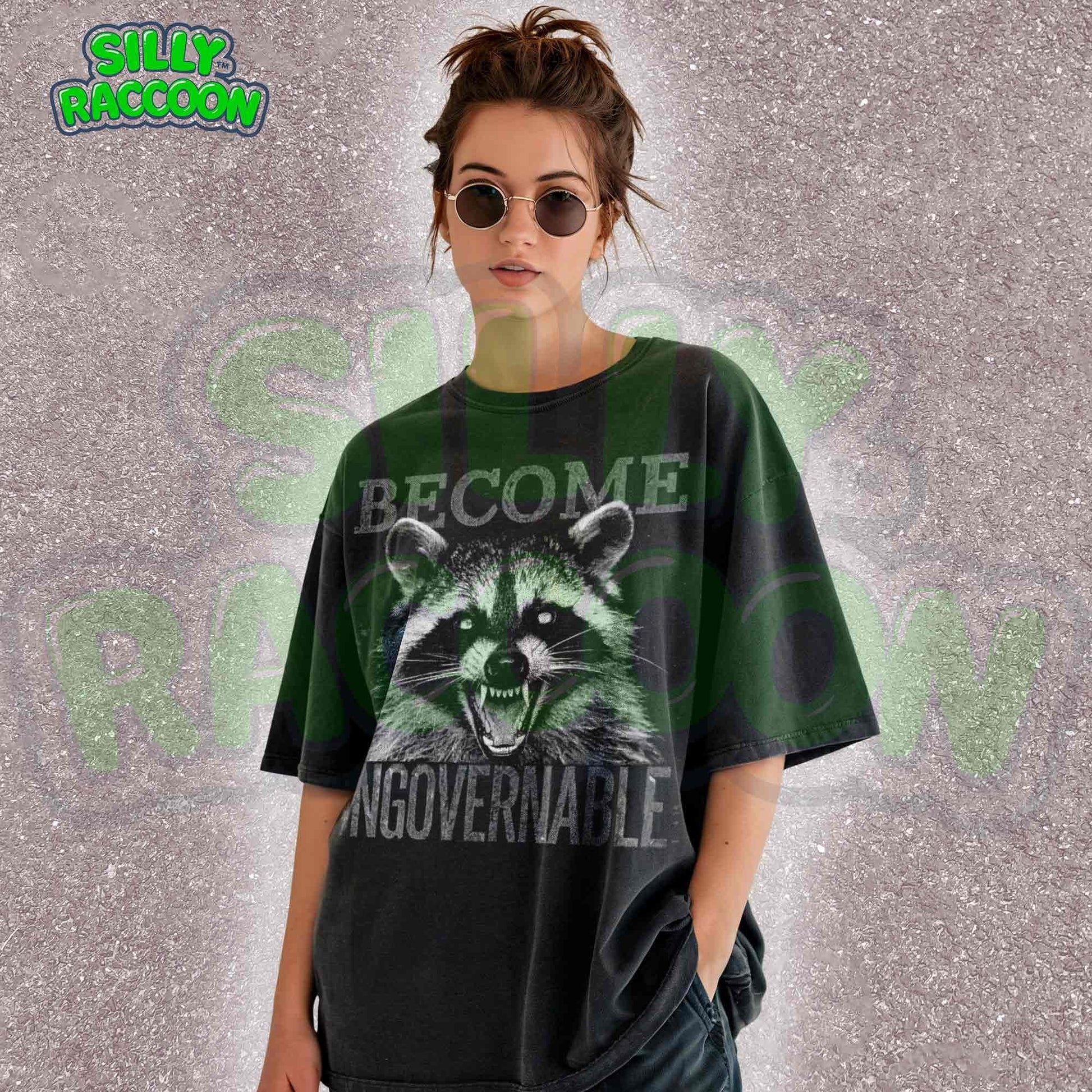 Vintage grunge dark grey t-shirt featuring an angry raccoon with the slogan Become Ungovernable. Perfect for fans of rebellious wildlife and sarcastic humor.