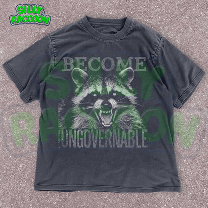 Vintage grunge dark grey t-shirt featuring an angry raccoon with the slogan Become Ungovernable. Perfect for fans of rebellious wildlife and sarcastic humor.