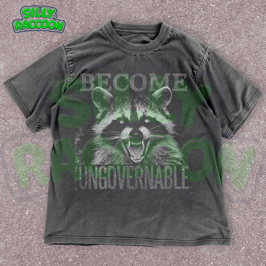 Vintage grunge dark grey t-shirt featuring an angry raccoon with the slogan Become Ungovernable. Perfect for fans of rebellious wildlife and sarcastic humor.