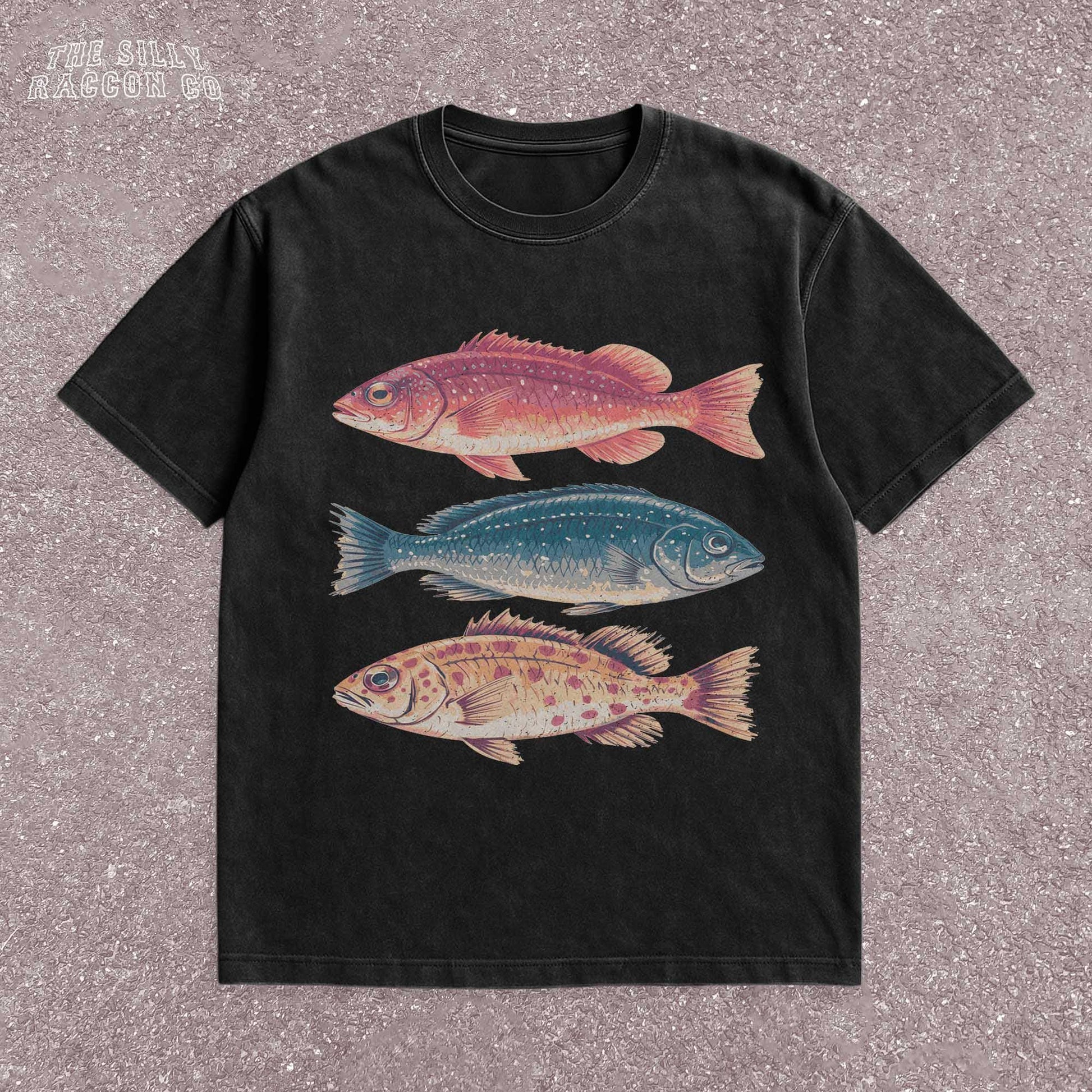 Vintage fish shirt for men and women featuring three illustrated fish in retro colors on a natural Comfort Colors tee. Perfect for outdoorsy types, ocean lovers, anglers, and marine biology fans. This nature-themed graphic t-shirt combines vintage style with beachy summer vibes. A great gift for fishermen, Father&#39;s Day, or anyone into fishing, sea life, or the outdoors. Classic fit with artistic nature illustrations.
