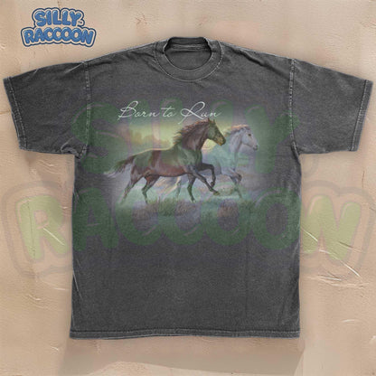 Horse t-shirt for women men equestrian lovers featuring beautiful watercolor running horses design on light gray background. Born to Run script text with brown horse and white horse galloping together through countryside. Perfect gift for horse moms, riders, trainers, western fashion lovers, farm owners and equine enthusiasts. Unisex casual tee with artistic wildlife illustration, ideal for horse shows, ranch work, country western events or casual everyday wear.