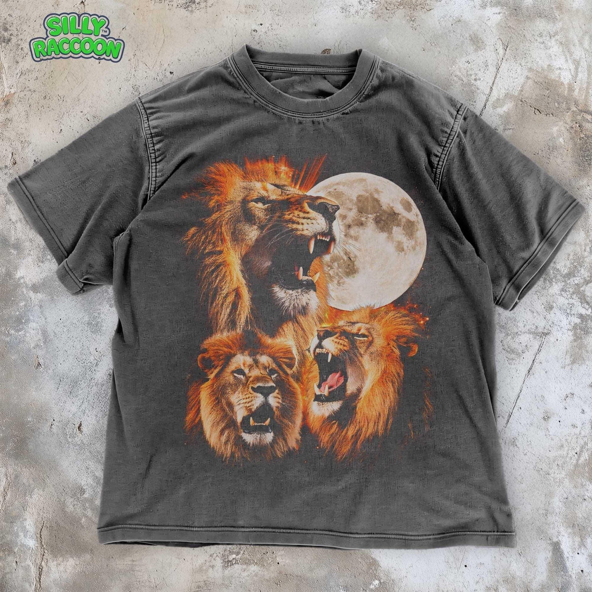 Unisex vintage style graphic t-shirt featuring three detailed lion heads roaring at a full moon, perfect for animal lovers and vintage fashion enthusiasts. Distressed gray cotton tee with realistic wildlife art, oversized fit, comfort colors Tee.