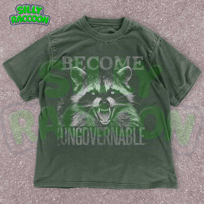 Vintage grunge dark grey t-shirt featuring an angry raccoon with the slogan Become Ungovernable. Perfect for fans of rebellious wildlife and sarcastic humor.