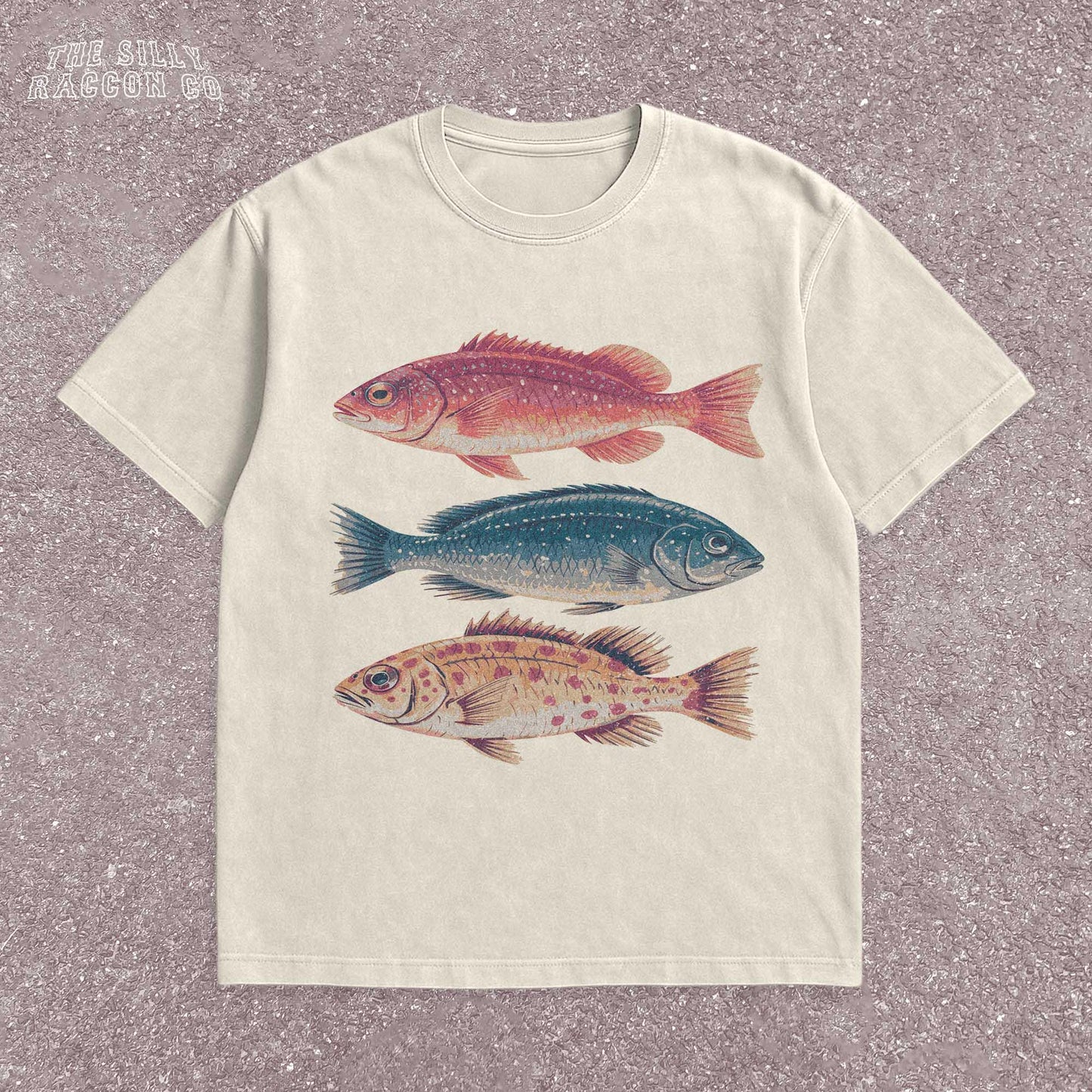 Vintage fish shirt for men and women featuring three illustrated fish in retro colors on a natural Comfort Colors tee. Perfect for outdoorsy types, ocean lovers, anglers, and marine biology fans. This nature-themed graphic t-shirt combines vintage style with beachy summer vibes. A great gift for fishermen, Father&#39;s Day, or anyone into fishing, sea life, or the outdoors. Classic fit with artistic nature illustrations.