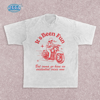 Retro style motorcycle white t-shirt featuring vintage red illustration of classic motorcycle with rider, stars and speed lines, combined with ironic existential crisis text in curved lettering, perfect for bikers.