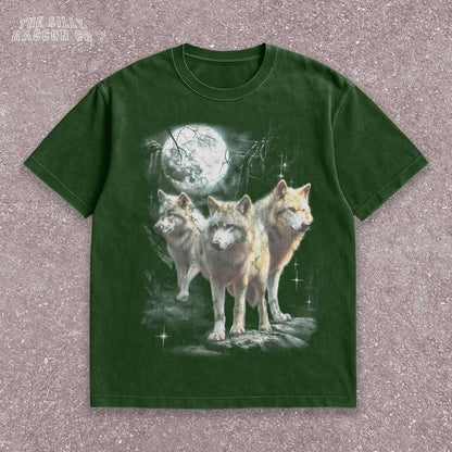 Vintage washed black graphic T-shirt for men, women, and unisex, featuring three realistic wolves standing proudly under a glowing full moon in a mystical forest setting. Retro style reminiscent of 90s nostalgia, perfect for animal lovers and humorously ironic aesthetics. Ideal funny gift for men, dads, brothers, or friends who appreciate spirit animal themes and quirky fashion. Soft, comfy fit makes this tee a standout piece for everyday casual wear or special occasions.