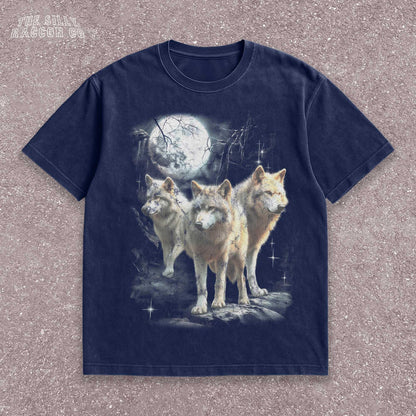 Vintage washed black graphic T-shirt for men, women, and unisex, featuring three realistic wolves standing proudly under a glowing full moon in a mystical forest setting. Retro style reminiscent of 90s nostalgia, perfect for animal lovers and humorously ironic aesthetics. Ideal funny gift for men, dads, brothers, or friends who appreciate spirit animal themes and quirky fashion. Soft, comfy fit makes this tee a standout piece for everyday casual wear or special occasions.