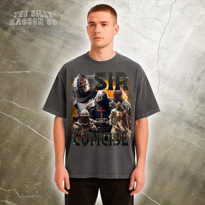 a man standing in front of a wall wearing a t - shirt